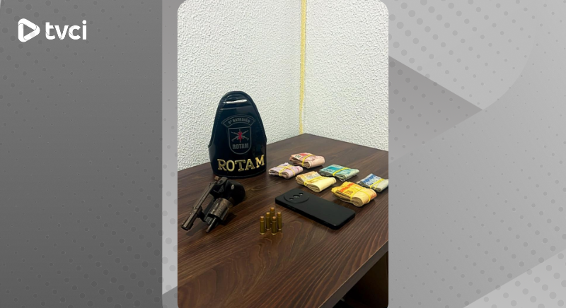 https://media.tvci.com.br/2025/05/5dd01253-arma-e-dinheiro-gtba.png